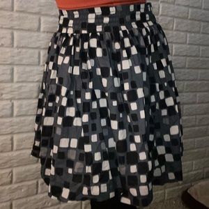 Adorable shirt with square pattern!